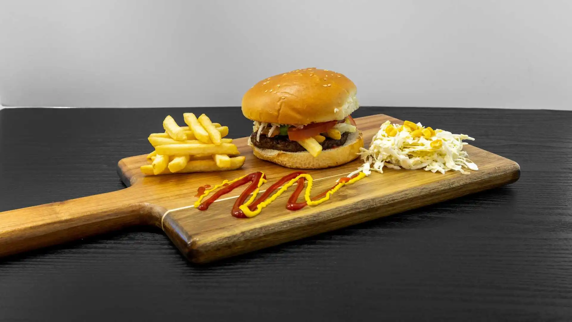 Lebanese Burger with seasoned patty and toppings at Shawarmero Lebanese Grill